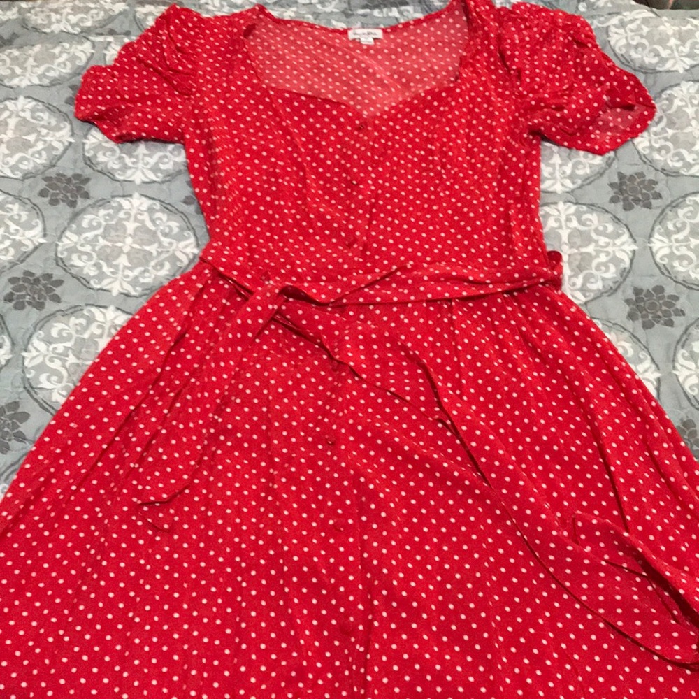 A red poka dot dress